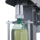 Tapadora semiautomática de botellas para tapas de plástico
