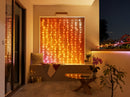 Luces navideñas Twinkly en forma de cortina, 210 LED RGB+W - Controladas por aplicación, sincronización con música, uso en interiores y exteriores, compatibles con Google Assistant, Amazon Alexa, Apple HomeKit, conectividad Bluetooth y WiFi